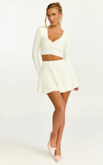 Naomi Two Piece Set - Contrast Knit Button Up Long Sleeve And Pleated Mini Skirt in Plain White