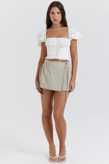 stone pleated wrap mini skirt