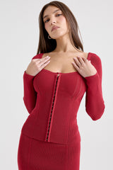 red fitted long sleeve top